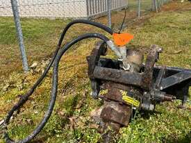 Posthole digger attachment suited for a Dingo - picture0' - Click to enlarge