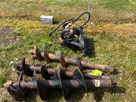 Posthole digger attachment suited for a Dingo - picture0' - Click to enlarge