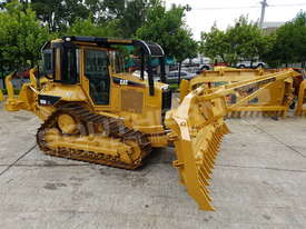 D5N XL Bulldozer with Stick Rake & Tree Spear DOZCATM - picture1' - Click to enlarge