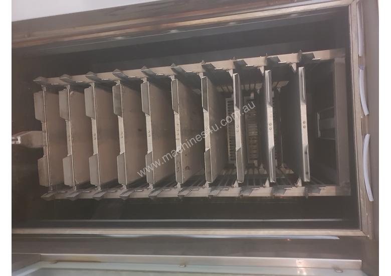 caption Rotary stone oven