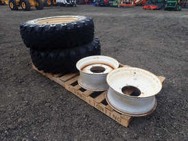 NOKIA INDUSTRIAL 10x16.5 8 STUD CATERPILLAR BOBCAT SKID STEER RIM & TYRE Tyre Tyre/Rim - picture0' - Click to enlarge