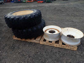 NOKIA INDUSTRIAL 10x16.5 8 STUD CATERPILLAR BOBCAT SKID STEER RIM & TYRE Tyre Tyre/Rim - picture1' - Click to enlarge