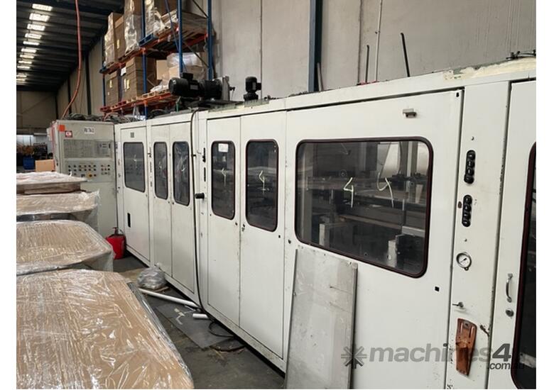 caption Illig - RV74 - Continuous Plastic Thermoform Machine